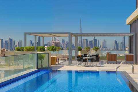 Outdoor pool, free cabanas, pool umbrellas