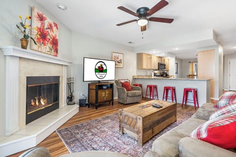 Living Room with Cable TV, Fireplace, Sofa Bed and Deck Access