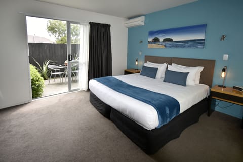 1 bedroom, premium bedding, laptop workspace, blackout drapes