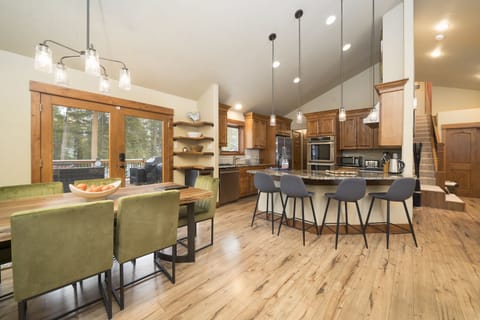 Main floor view of dining room and breakfast bar.