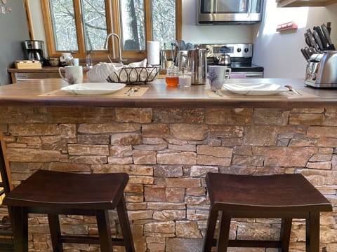 Additional seating for 2 at the kitchen counter.