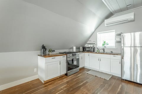 Upstairs - Fully stocked kitchen