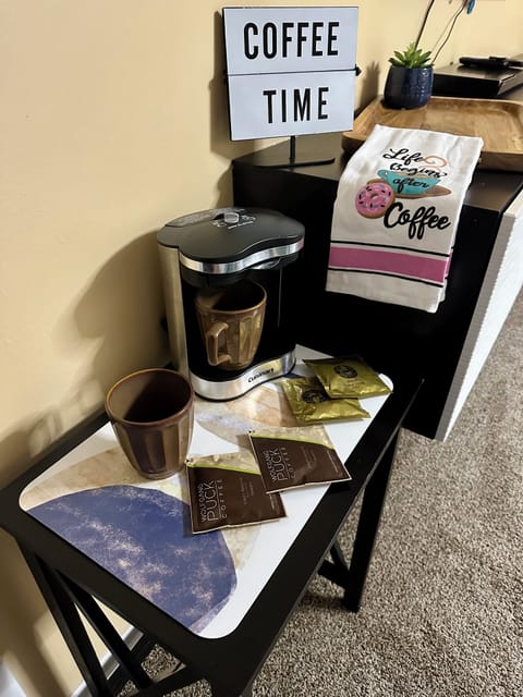 The primary bedroom has a private coffee bar.