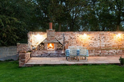 The brick chimney barbecue creates the perfect alfresco dining experience