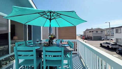 Private upper deck with outdoor dining, ocean views, and refreshing sea breezes. Perfect for coffee, cocktails, and relaxing after a day at the beach.