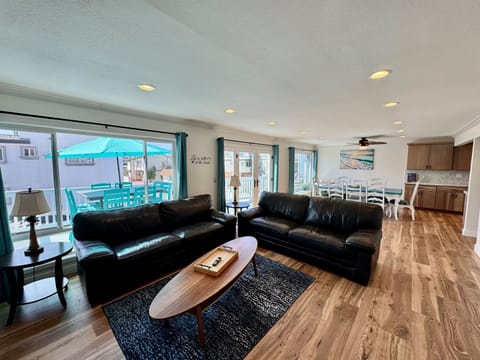 Open Living Space with direct access to Ocean-View Balcony for indoor-outdoor coastal living.