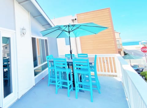 Open Living Space with direct access to Ocean-View Balcony for indoor-outdoor coastal living.