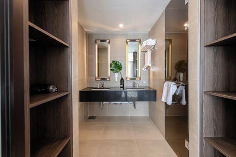 Suite, Multiple Beds, Non Smoking | Bathroom | Shower, rainfall showerhead, hair dryer, bathrobes