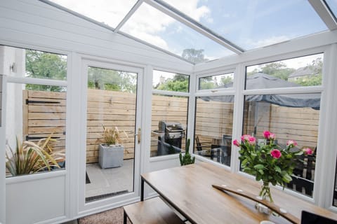 Dining conservatory, fully tiled with under-floor heating