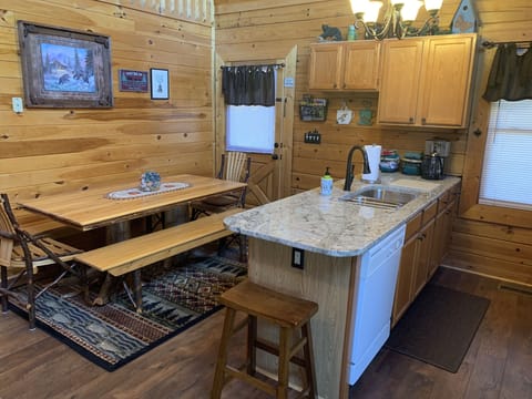 Enjoy the new granite and new flooring! dining seating for 8-10.