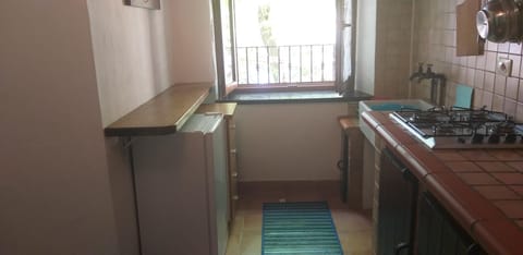 Apartment | Private kitchen | Stovetop, electric kettle, toaster, cookware/dishes/utensils