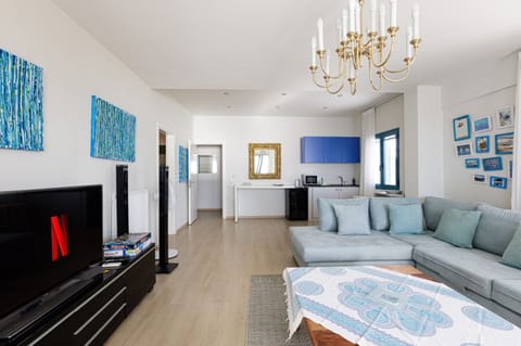 Second living room features 3D 50’’ TV a perfect play room and for movie night.