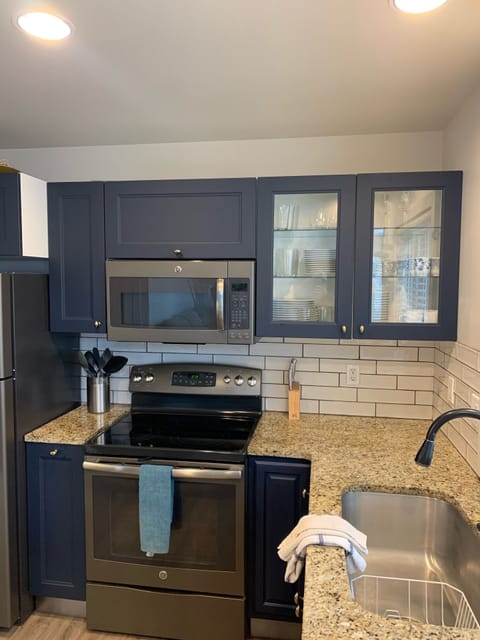 Upper kitchen fully stocked with everything you need.