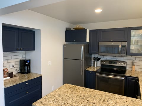 Upper kitchen fully stocked with everything you need.