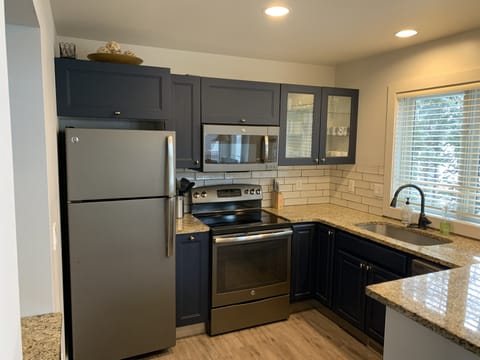 Upper kitchen fully stocked with everything you need.