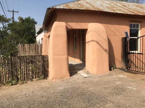 Mid-19th century adobe house located where Old Town ends and Route 66 passes by.