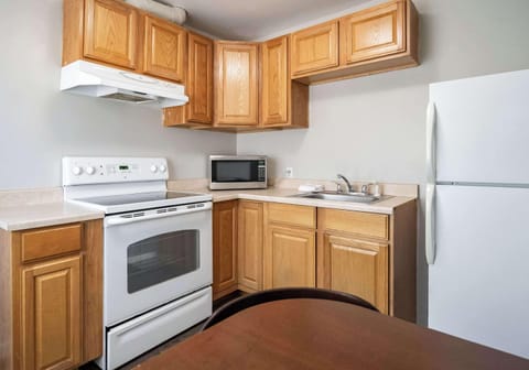 Blackout drapes, iron/ironing board, free cribs/infant beds