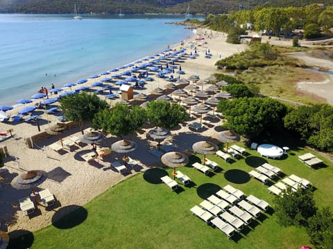 Private beach, white sand, sun loungers, beach umbrellas