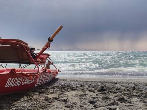 Sky, Water, Cloud, Umbrella, Azure, Shade, Outdoor Furniture, Coastal And Oceanic Landforms