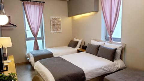Deluxe Triple Room | Desk, free WiFi