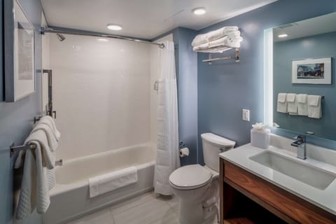 Designer toiletries, hair dryer, towels, soap