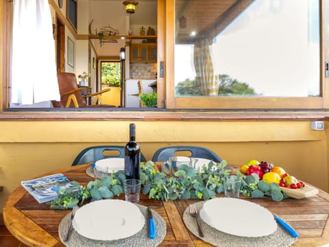 Tableware, Table, Property, Window, Plant, Dishware, Interior Design, Textile, Plate, Wood