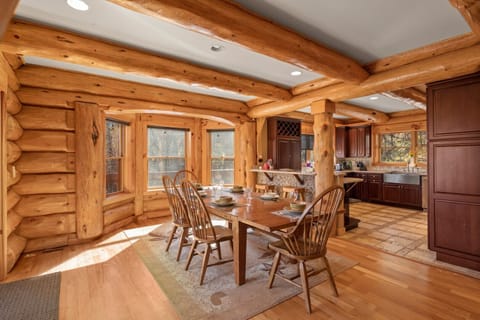 Formal dining area with overflow dining at the breakfast bar.