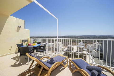Sunny Terrace with panoramic and distant seaviews. 