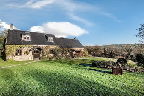 Heather Cottage to the left of Tansy with fab views and lawns