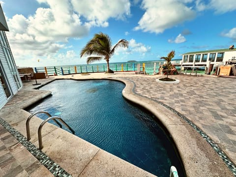 Outdoor pool, free cabanas, pool umbrellas