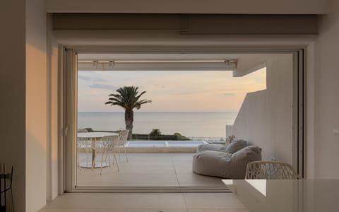 Luxury Villa, 4 Bedrooms, Sea View, Beachfront | Living area | 45-inch Smart TV with digital channels, TV, fireplace
