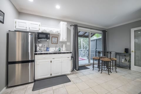 Upstairs kitchenette + deck access