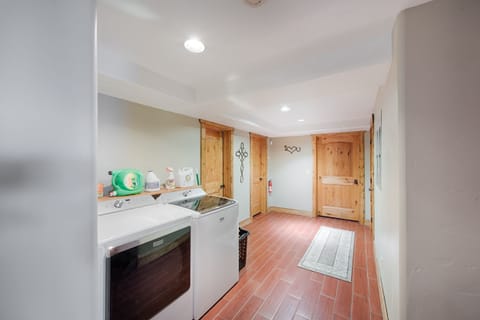 Lower level laundry.  2nd washer and dryer upstairs.