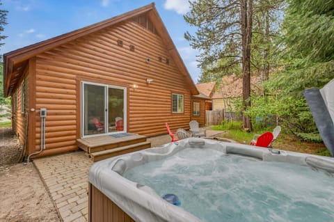 Back patio with hot tub and fire pit