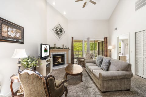 Living Room, Cable TV, Seasonal Fireplace, Sleeper Sofa, and Deck Access