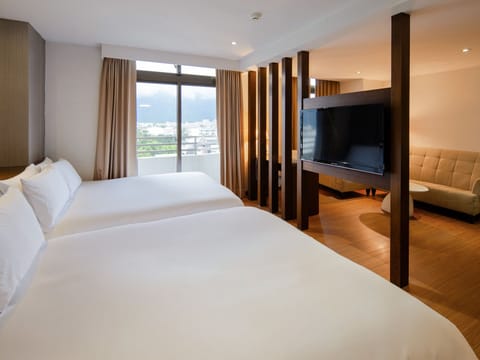 Family Quadruple Room | Down comforters, in-room safe, individually decorated