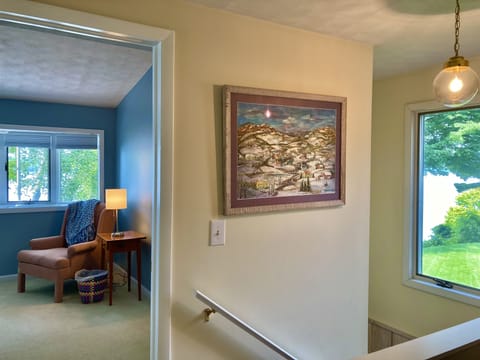 View of the master bedroom and Lakeview window from upstaIrs.