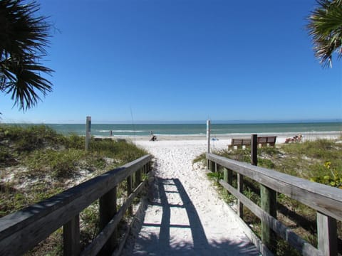 Indian Shores Beach Access is directly across the street - Indian Shores Beach Access is directly across the street and not a far walk! Plus there are a few restaurants, ice cream shops, and other stores in just steps from this complex