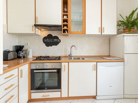 Kitchen, Kitchen Appliance, Countertop, Cabinetry, Major Appliance, Wood, Furniture, Interior Design, Room, Home Appliance