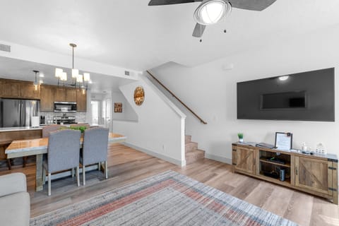 The Highland Hangout- open concept floor plan with dedicated dining and breakfast bar.