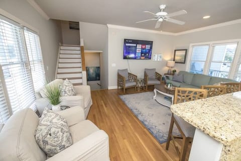 A spacious and thoughtfully laid out living room is inviting. Queen sleeper sofa