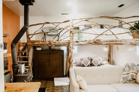 Note: The fireplace has been removed from the room. Behind front door interior