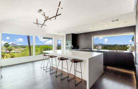 Gather, dine, and make memories under soaring ceilings with panoramic views all around.