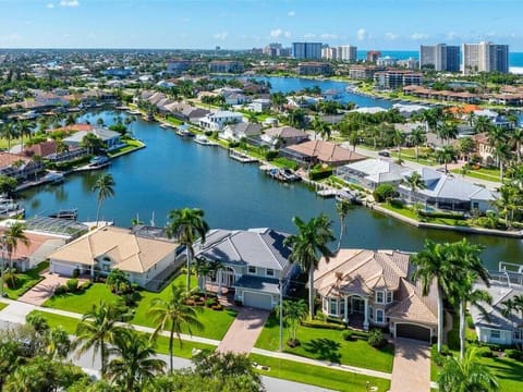 Aerial of Front of Home and Waterway