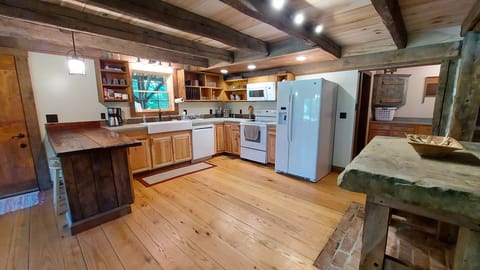 Large fully stocked kitchen.
