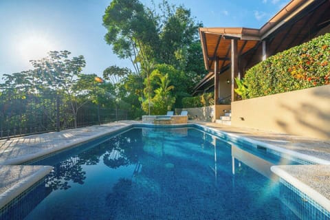 Large swimming pool with smaller plunge pool for sitting and relaxing 