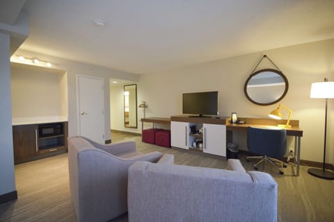 Suite, 1 King Bed, Non Smoking | In-room safe, desk, laptop workspace, iron/ironing board