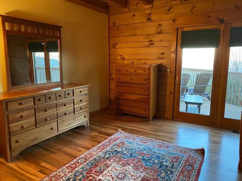 Bedroom #2 with plenty of clothing storage, deck access, and views.  