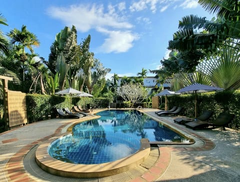 Outdoor pool, open 8:00 AM to 9:00 AM, sun loungers