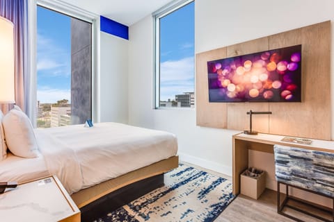 Down comforters, pillowtop beds, in-room safe, laptop workspace